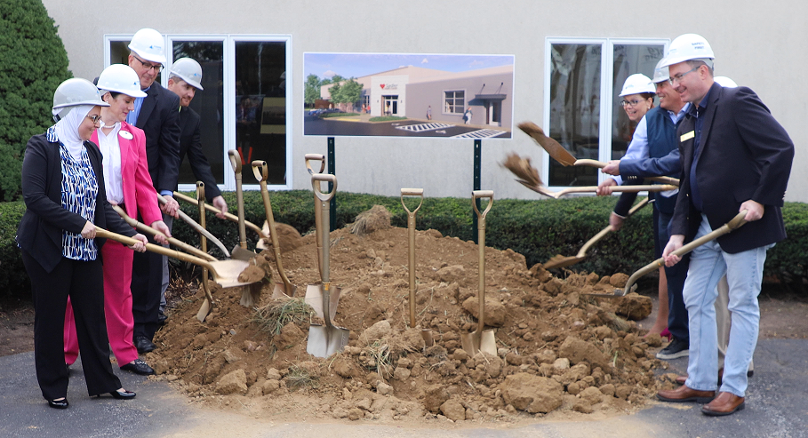Members of the community hold shovels for a groundbreaking at Sadler Health Center's newest location in Mechanicsburg.