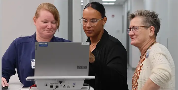 Katrina Thoma, RN MSN CPNP-PC DPH, consults with the Sadler team.